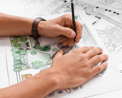Professional working on commercial landscape layout